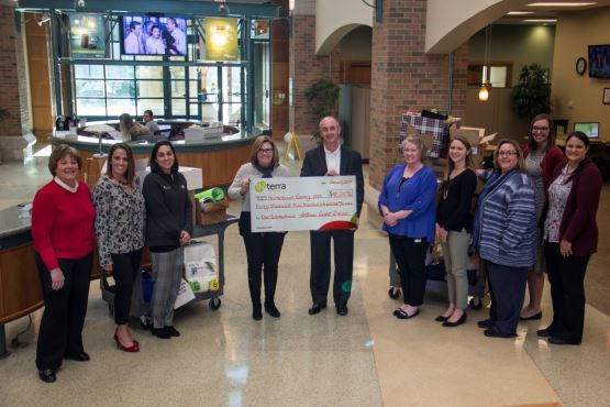 Interra Credit Union CEO, Amy Sink, and David Birky, Chief Strategy Officer, are flanked by members of the credit union’s Hometown Giving service project committee. The big check represents the more than $40,000 donated to agencies throughout the credit union’s footprint.